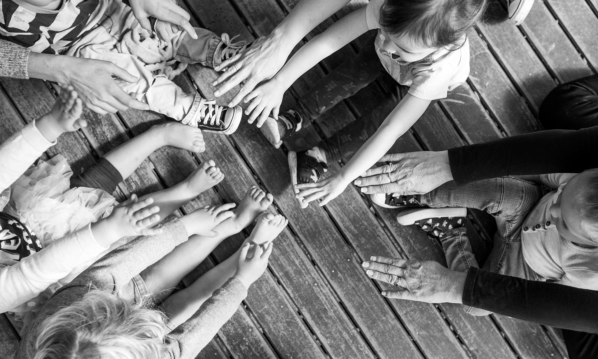 Hands joining together in a circle